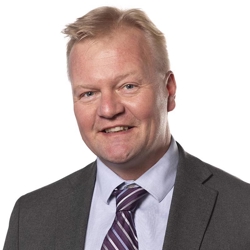 Headshot of Dr. Tomi Pastinen smiling.